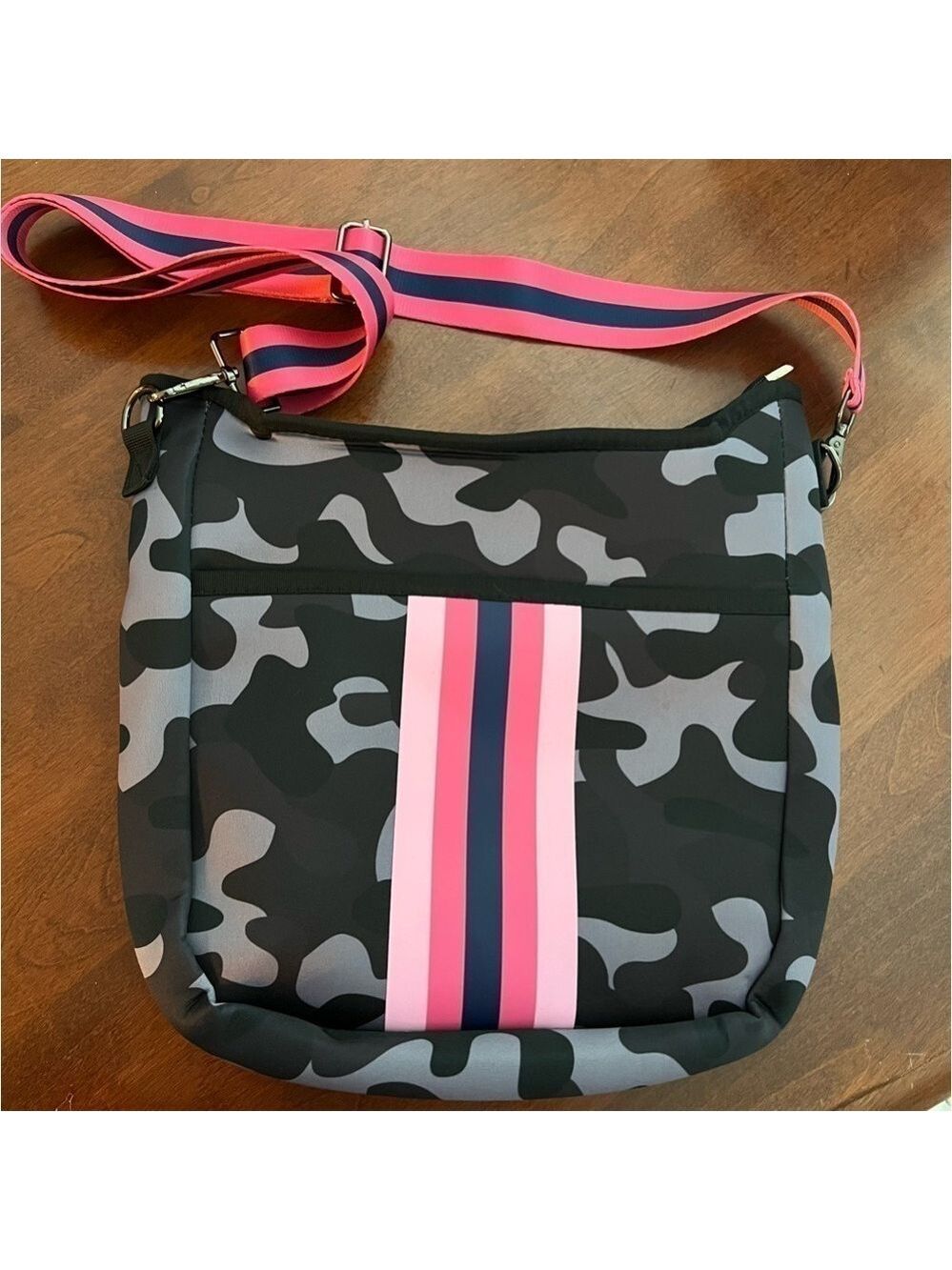 Like New Neoprene Crossbody Bag. Black/Gray Camo print with pink/navy strap.